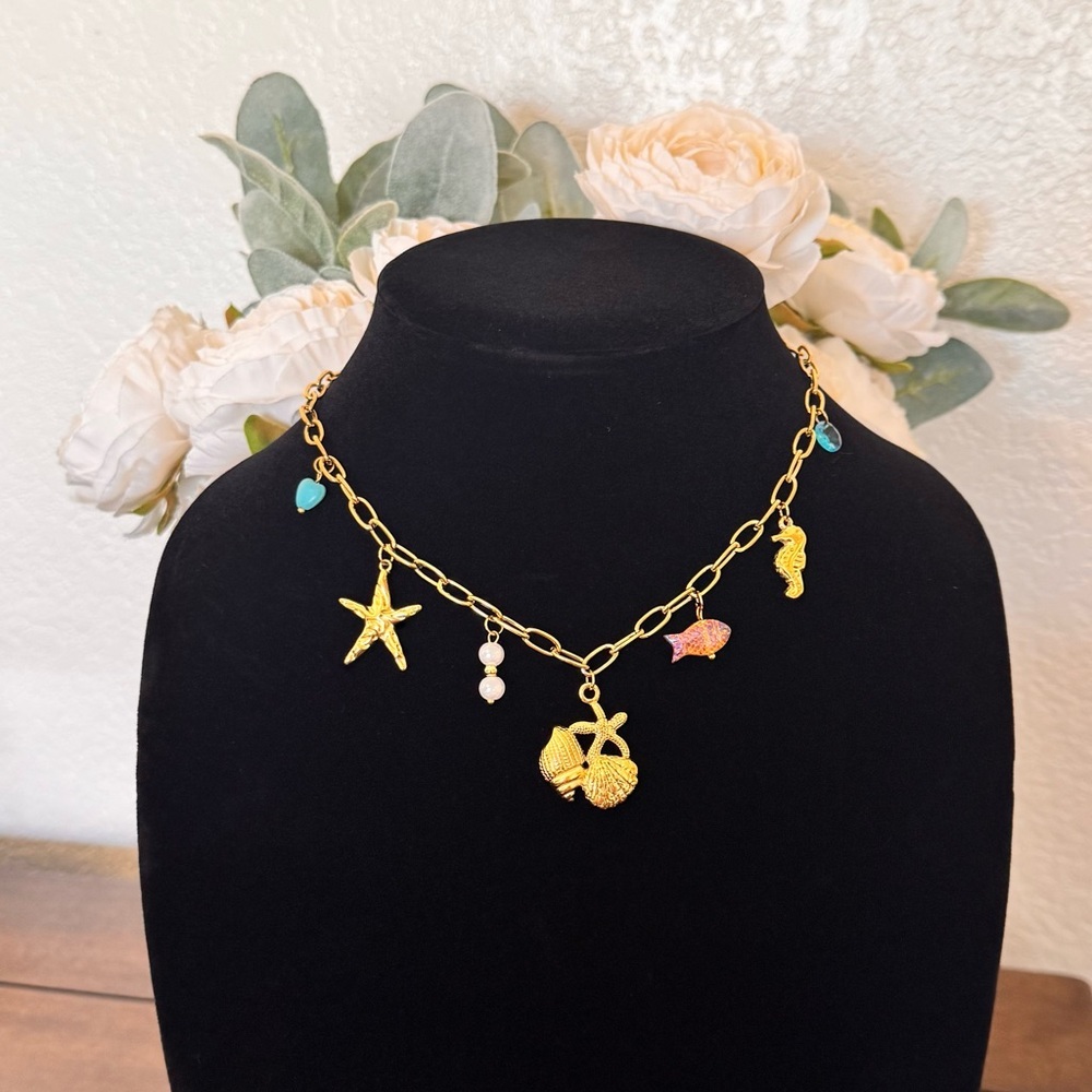 Elegant Gold Sea Charm Necklace - Picture 2 of 4